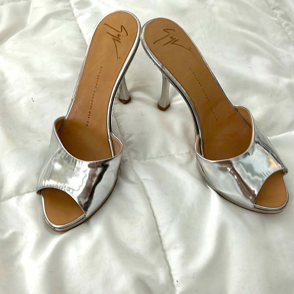 Brand new silver heel all leather sole!!! Bought at Saks !!! Unique high quality
